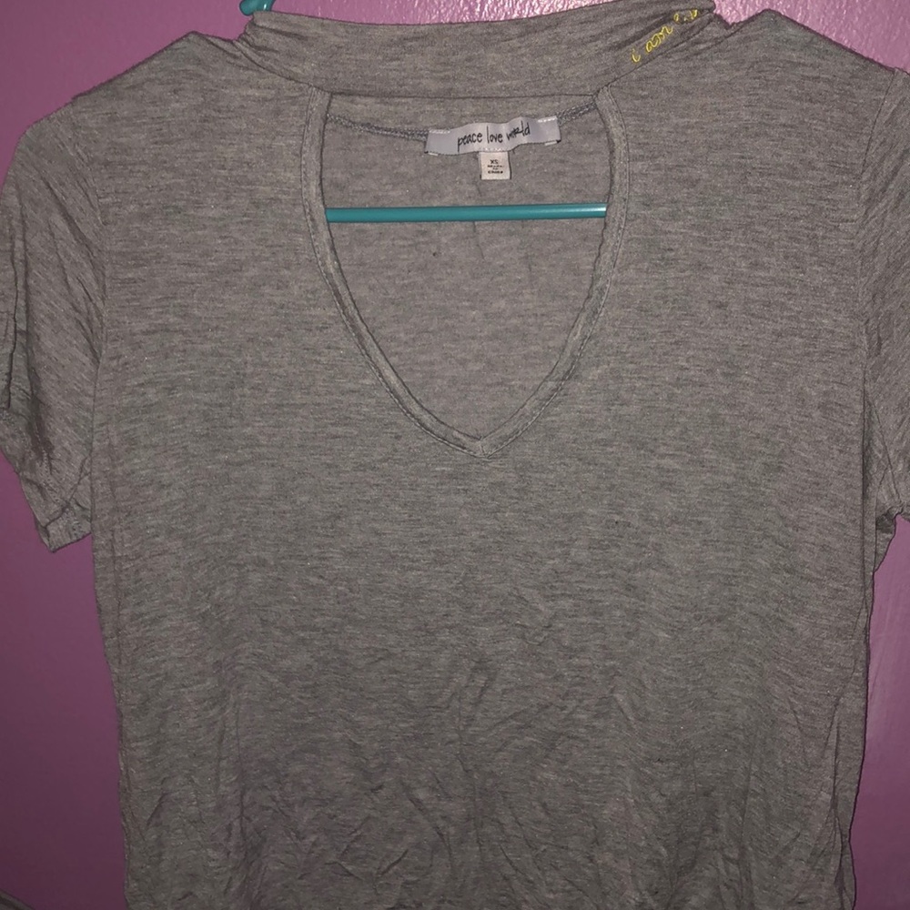 A grey crop top